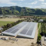 FCP Solar Array Reservoir Covers Showing two custom steel fabricated covers over a farmers reservoir.